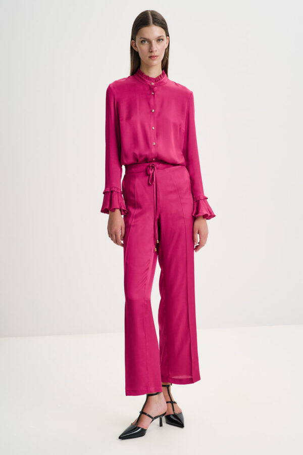 Shirt in viscose with frilled details.